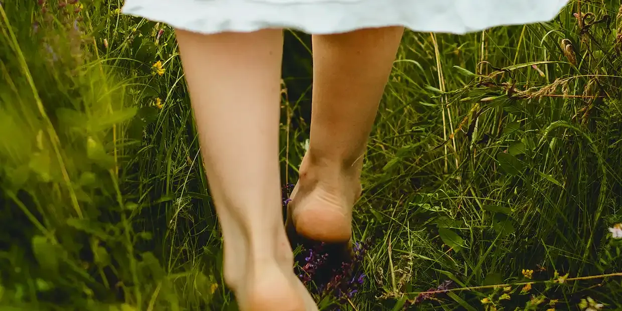 Smooth bare feet with a foot peel mask bootie