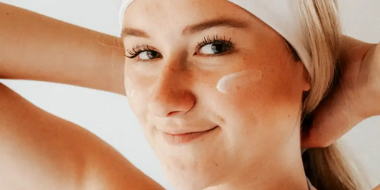 Person wearing an LED light therapy face mask